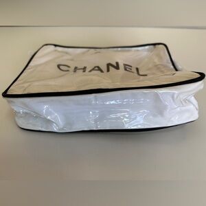 Chanel Beauty Cosmetic Case, in white, lined with black canvas &plastic cover.